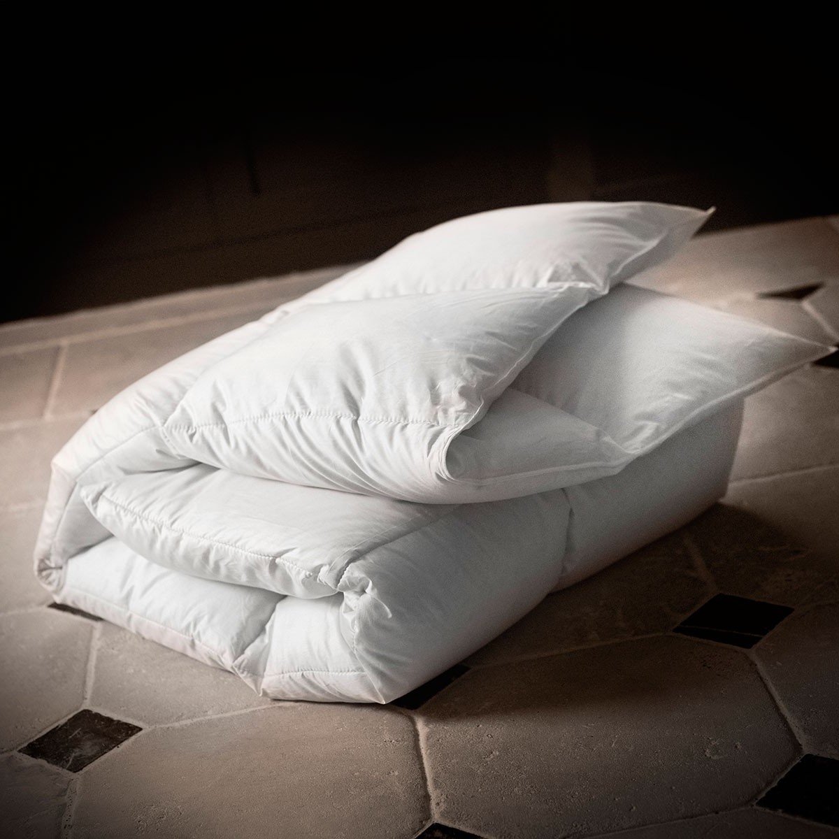 couette en plume pressing